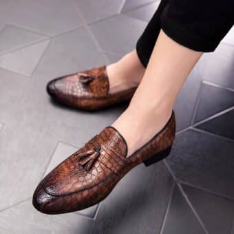 Brown tassel loafer with crocodile-skin look