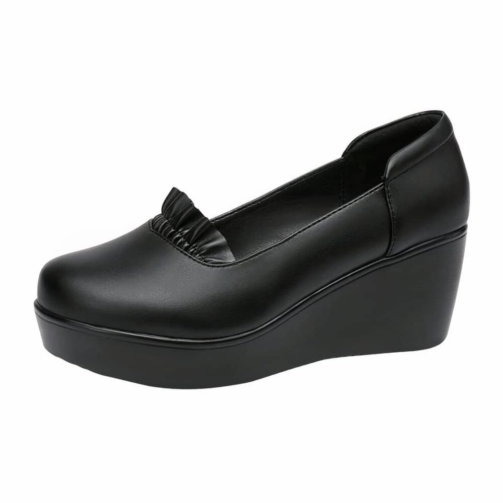 Photo of a black wedge loafer on a white background