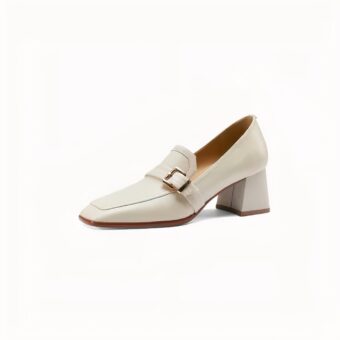 White loafer with high square heel on white background