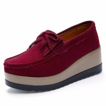 Photo of a red platform loafer on a white background