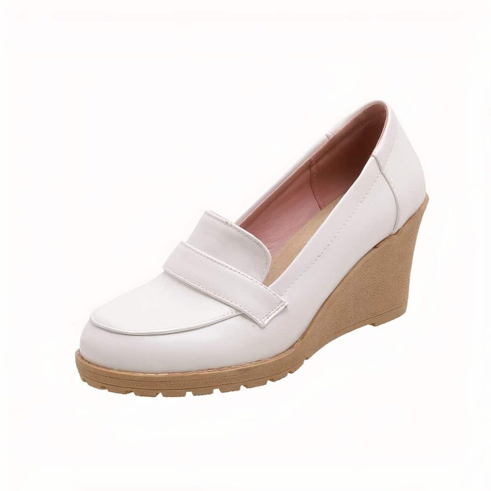 Photo of a white wedge loafer on a white background