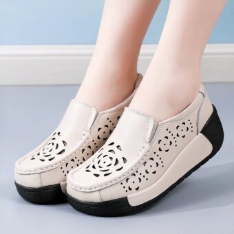 Photos of beige leather platform orthopedic moccasins with flower-shaped air holes, worn