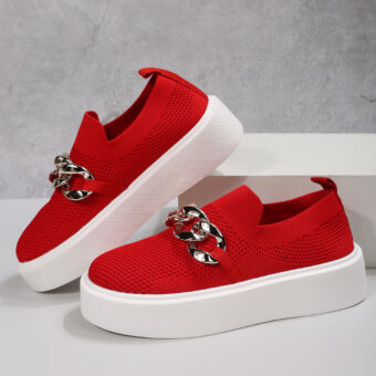Photo of red platform loafers with metal chain