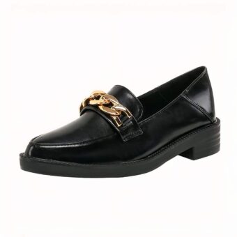 Black patent leather moccasin with decorative gold chain on a white background
