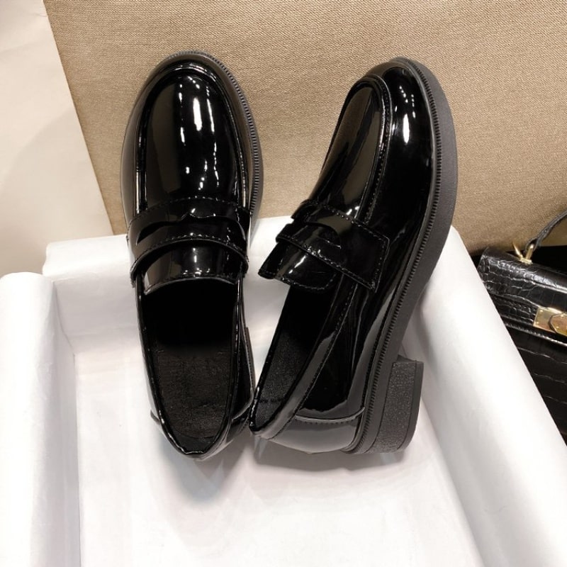 Black patent leather loafers with heels