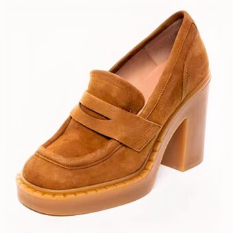 Brown suede loafer with small heel on white background