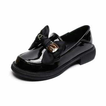 British-style black loafers with bow tie for women with white background
