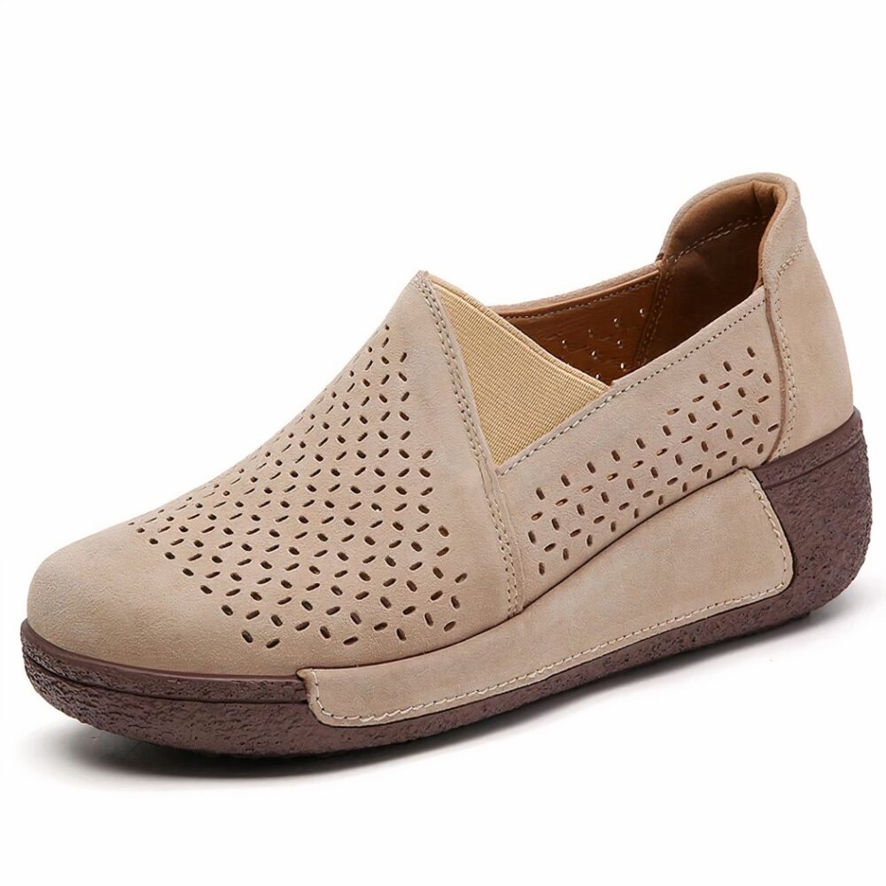 Beige openwork wedge loafer on white background