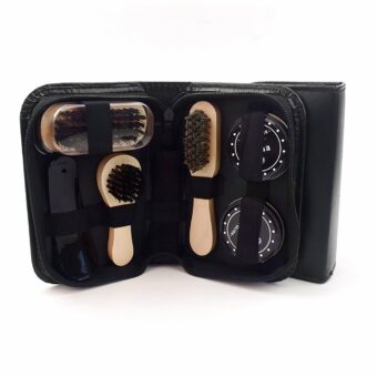 Shoe care kit in open black case