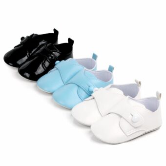 Three pairs of leather moccasins for baby boys, in white, blue and black