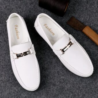 Men's white leather-effect loafers with grey background