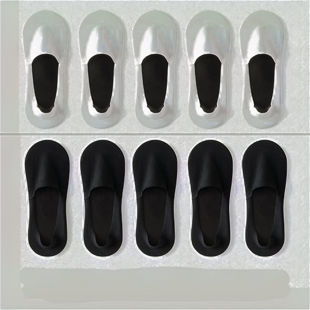 5 white socks at the top and 5 black socks at the bottom of the image