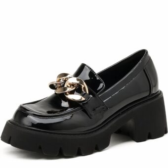 Patent leather platform loafers with gold chain detailing for women in black with white background