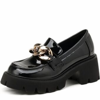 Patent leather platform loafers with gold chain detailing for women in black with white background