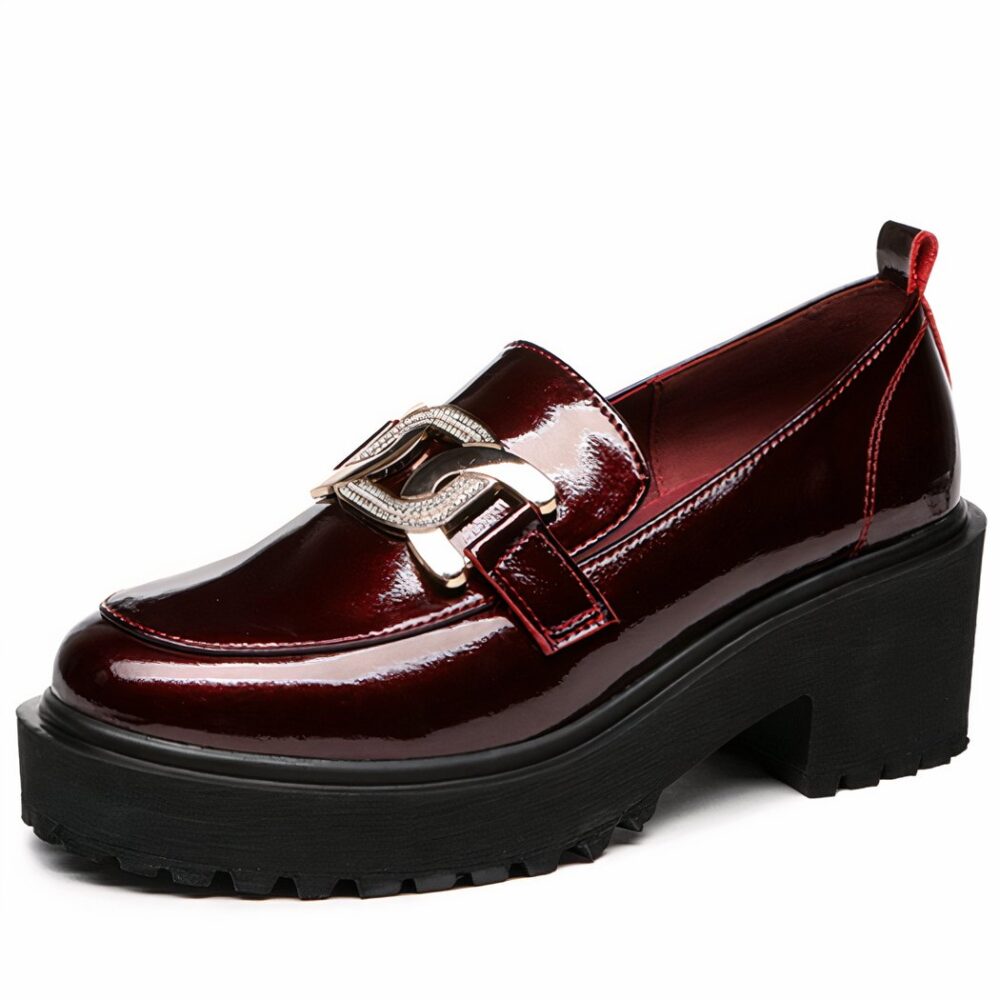 Platform loafers with sparkling gold chain for women on a white background