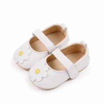 White baby girl moccasins with flower motif on top