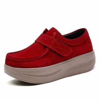 Suede-effect moccasin with side velcro fastening in red on a white background
