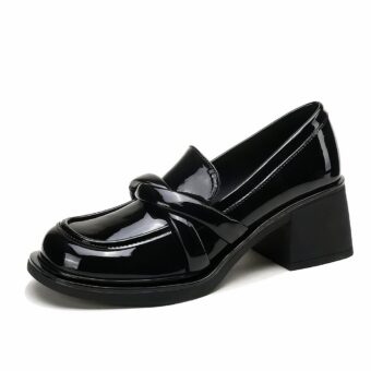 Women's black square heel loafers with white background