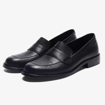 Classic elegant leather loafers for women on a white background