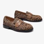 Leather leopard loafers for women on a white background
