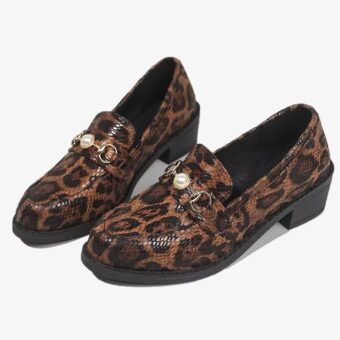 Snake-effect leopard loafers with pearl detail on a white background