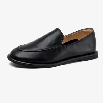 Single slipper-style loafers for women on a white background