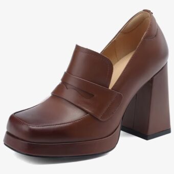 A brown heeled leather loafer for women on a white background