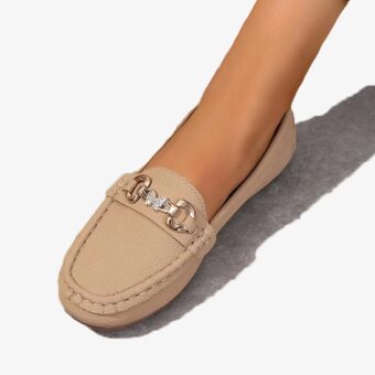 Single casual loafer with a chain and rhinestone details on a white background