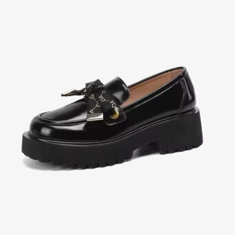 Photo of a women's black bow platform loafer