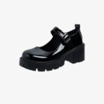 A black patent Chunky Mary Jane loafer and a strap at the top