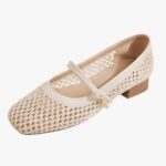 Women’s knit loafer ballerinas on a very light gray background